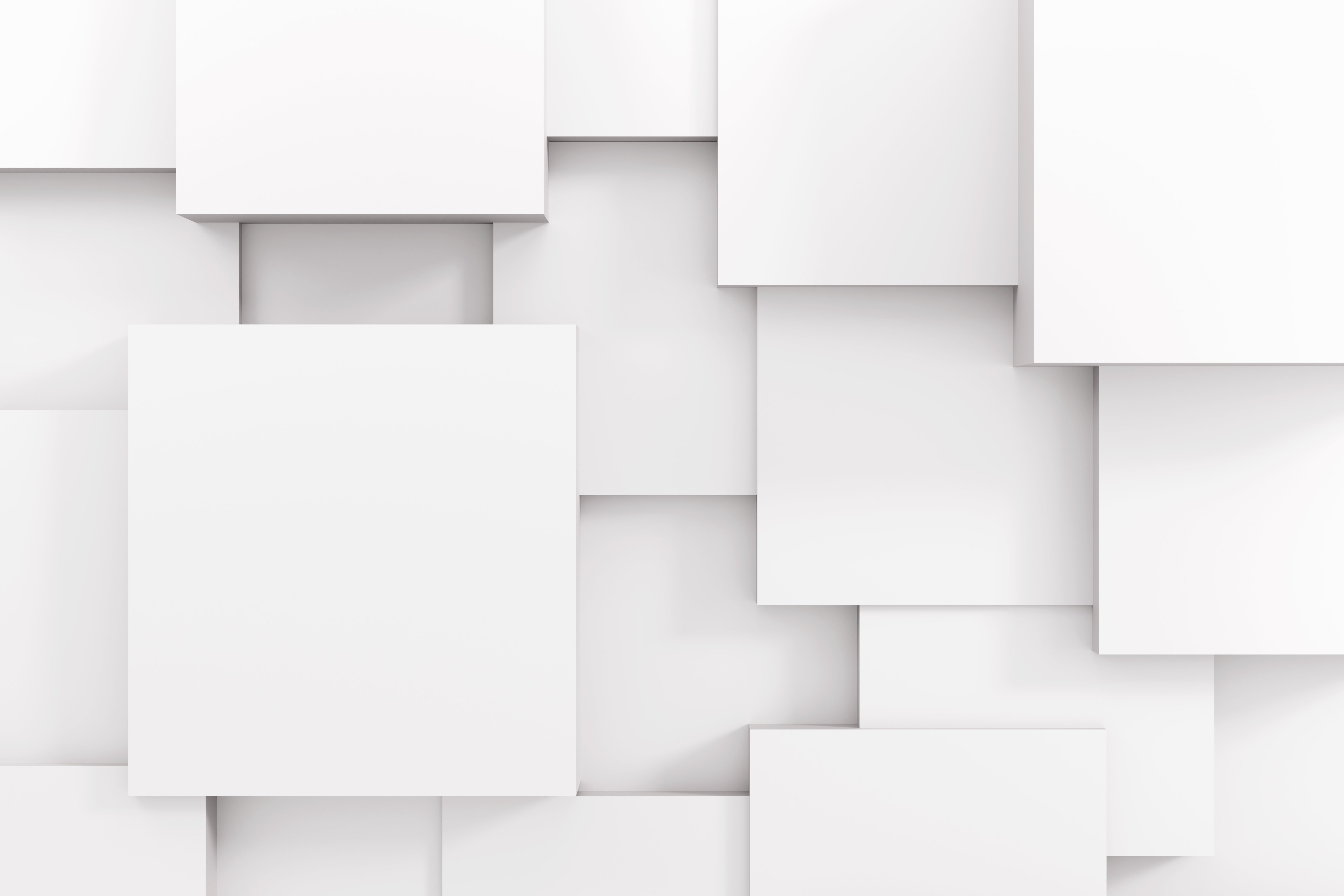 Weiße Quadrate mit 3D-Effekt vor- und nebeneinander.